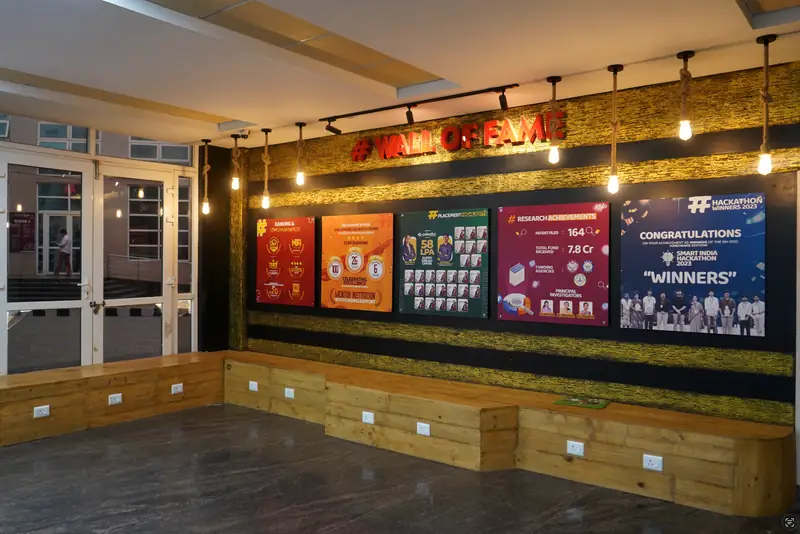 Wall of Fame displaying university rankings, placement and research achievements