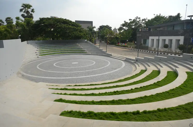 Open-air amphitheatre with tiered seating on campus