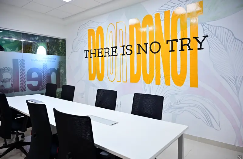 Discussion room with a motivational wall mural
