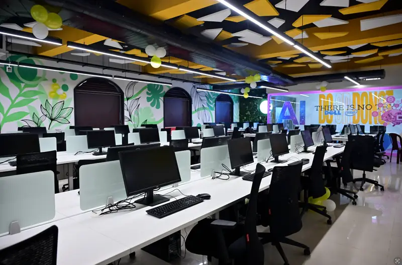Computer lab with rows of desktop workstations